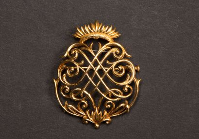 Gold brooch with interlacing coat of arms.
750°/00...