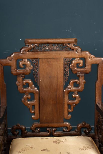 Carved exotic wood salon with three armchairs...