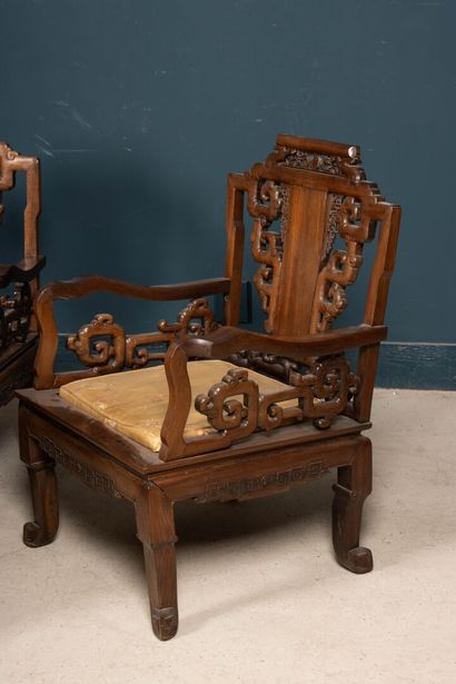 Carved exotic wood salon with three armchairs...