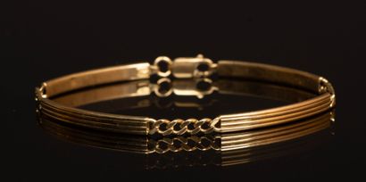 Gold bar link bracelet.
750°/00 gold. 
Length:...