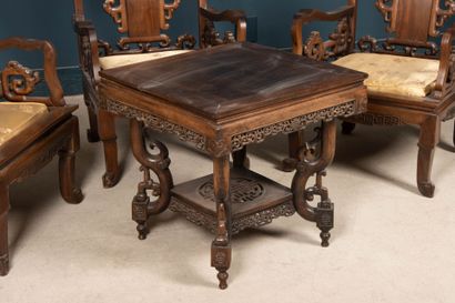 Carved exotic wood salon with three armchairs...