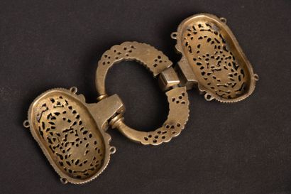 Openwork and chased silver belt buckle decorated...