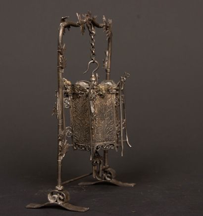 Portico supporting a miniature silver and...