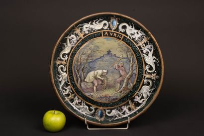 Stoneware dish with enameled decoration of...