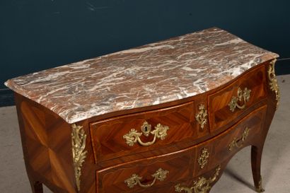 All-sided curved chest of drawers in amaranth...