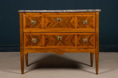 Chest of drawers in walnut with butterfly...