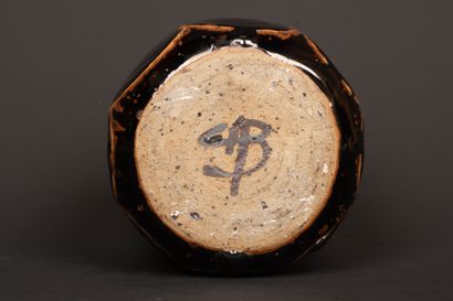 Brown-black enameled stoneware box with cut...
