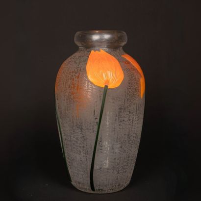 DAUM.
Baluster vase with hemmed neck in thick,...
