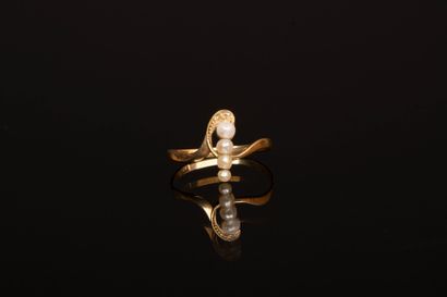 Antique gold ring with a line of small pearls.
Gold...