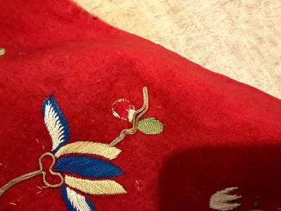 Pair of embroidered red silk curtains.
China...