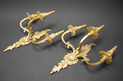 Pair of three-light bronze sconces.
Louis...