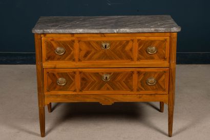 Chest of drawers in walnut with butterfly...