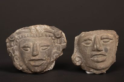 Reunion of two carved stone fragments depicting...