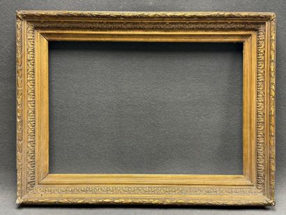 Cadre en bois et stuc doré. 
Dim. intérieur:...