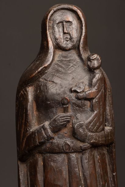 Vierge à l'enfant en chêne sculpté
Art Populaire...