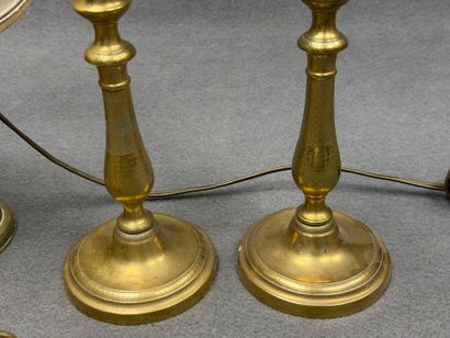 Deux paires de bougeoirs dont deux montés...