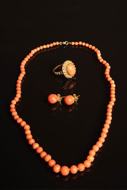 Gold and coral ring. Weight: 5.40 g, 
Necklace,...