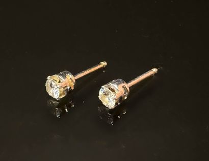 Pair of gold and diamond earrings, approx....
