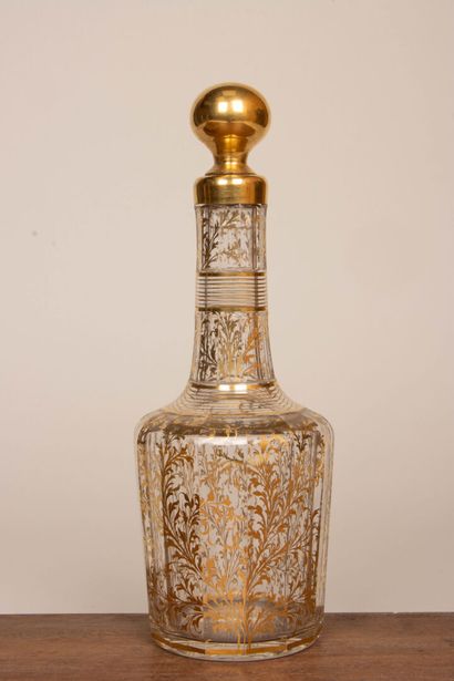 Service à liqueur en verre doré comprenant...