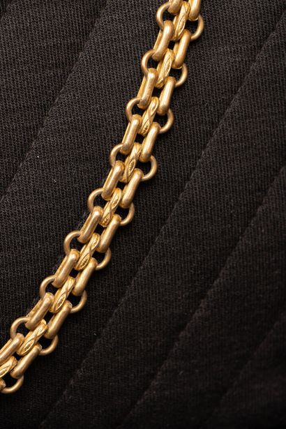 CHANEL. Evening bag in black jersey with...