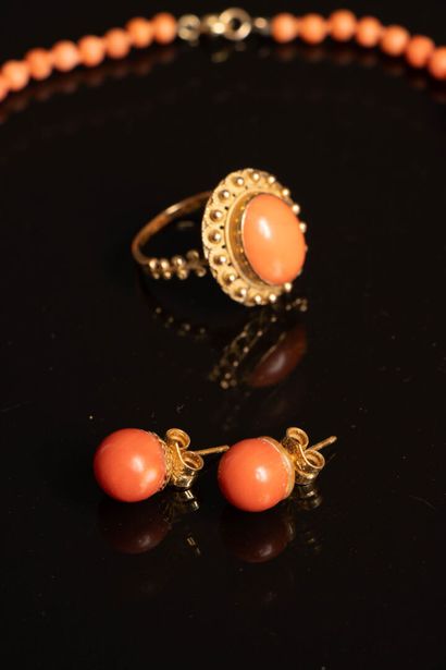 Gold and coral ring. Weight: 5.40 g, 
Necklace,...