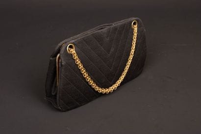 CHANEL. Evening bag in black jersey with...
