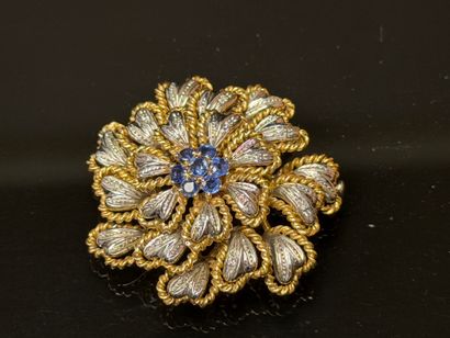 White gold and yellow gold brooch featuring...