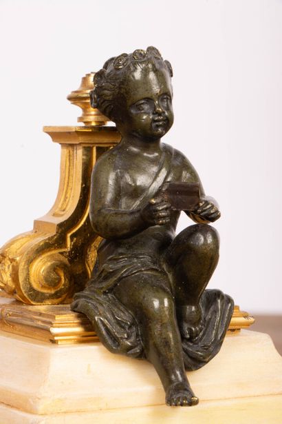 Paire de statuettes en bronze doré et patiné...