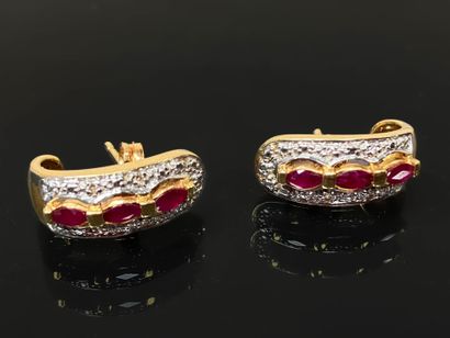 Pair of gold earrings set with small diamonds...