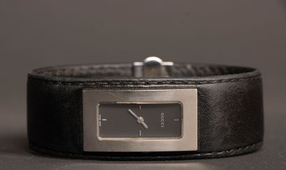 GUCCI
Black leather and steel cuff watch
Quartz...