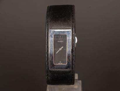 GUCCI
Black leather and steel cuff watch
Quartz...