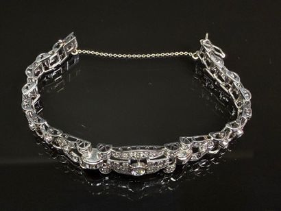 Articulated bracelet in platinum and gold...