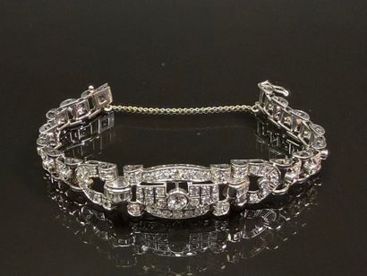 Articulated bracelet in platinum and gold...