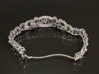 Articulated bracelet in platinum and gold...