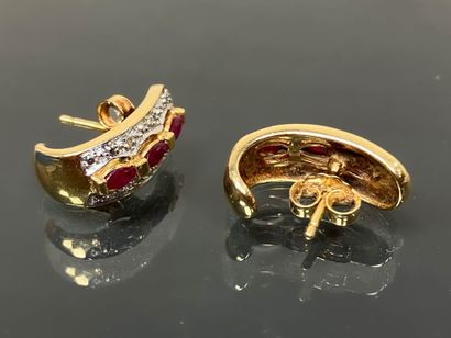 Pair of gold earrings set with small diamonds...