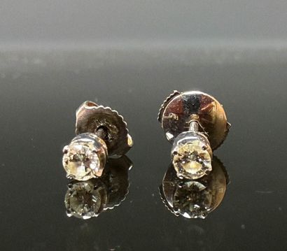 Pair of gold and diamond earrings, approx....