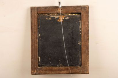 Cadre reliquaire en verre églomisé d'arcature...