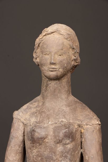 Ecole Française XX°
Jeune femme à l'oiseau.
Sculpture...