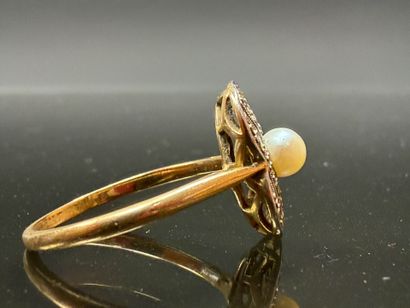 Gold ring set with a cultured pearl surrounded...