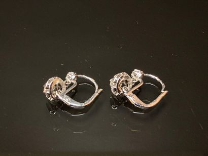 Pair of sleeper earrings in white gold set...