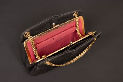 CHANEL. Evening bag in black jersey with...