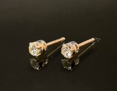 Pair of gold and diamond earrings, approx....