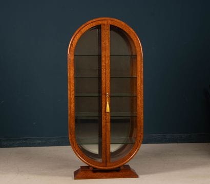 Vitrine de forme ovale en placage de loupe,...
