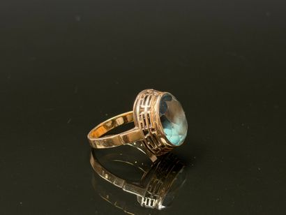 Yellow gold ring set with a green stone.
Polish...