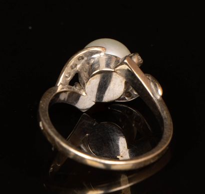 White gold ring set with a cultured pearl...