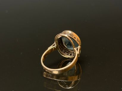 Yellow gold ring set with a green stone.
Polish...