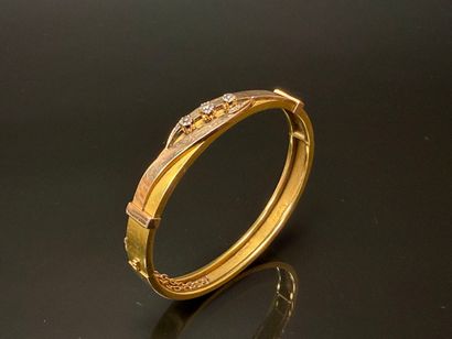 Semi-rigid gold bracelet set with three diamonds,...
