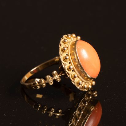 Gold and coral ring. Weight: 5.40 g, 
Necklace,...