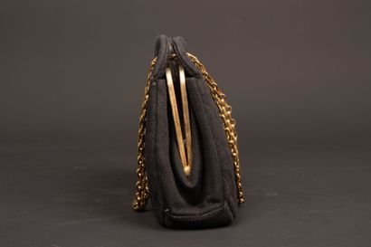 CHANEL. Evening bag in black jersey with...