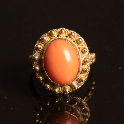 Gold and coral ring. Weight: 5.40 g, 
Necklace,...
